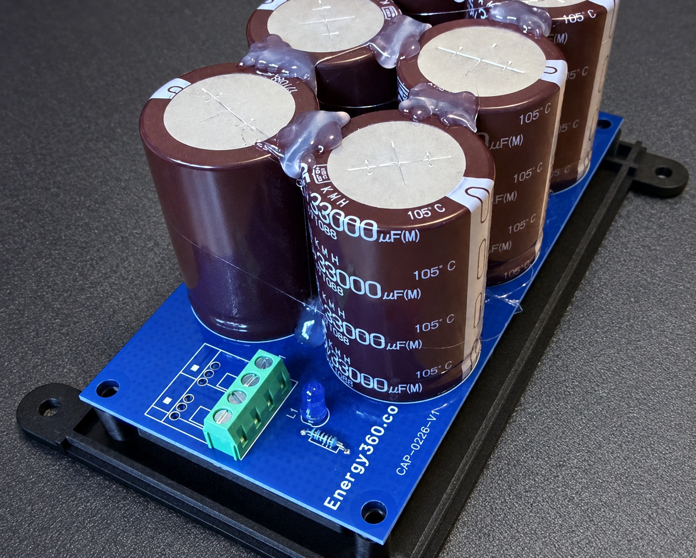 Energy360 capacitor bank installed on its black mounting frame