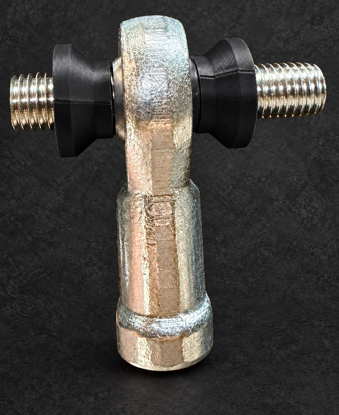 Heim joint with spacers fitted on either side