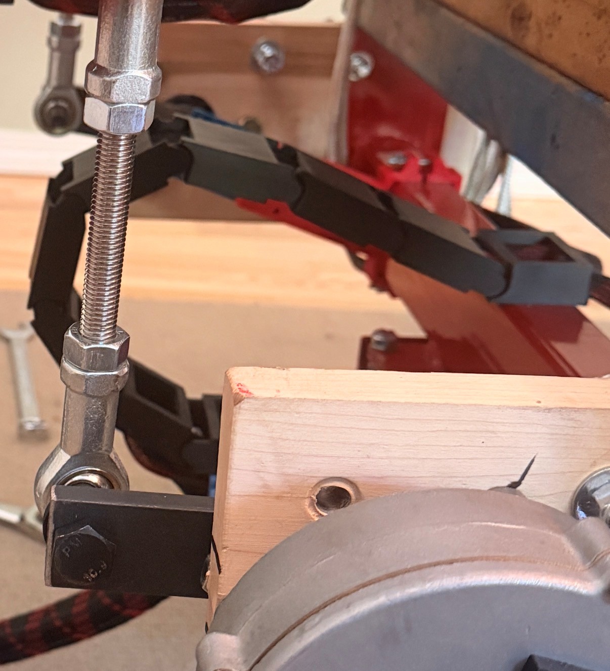 Surge axis cable protector installed on a motion simulator